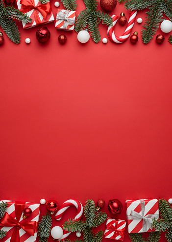 Merry Christmas and happy New Year vertical red background. Flat lay, top view and copy space for text