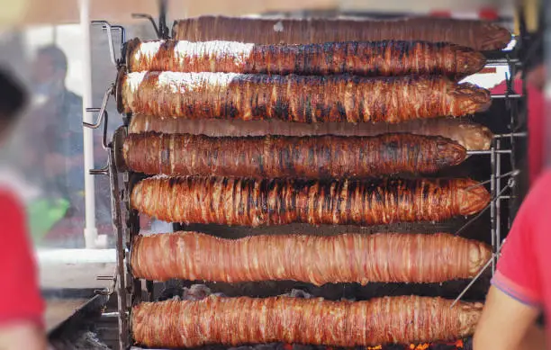 Photo of Turkish food made with the intestines of bovine or ovine animals it's called kokorec