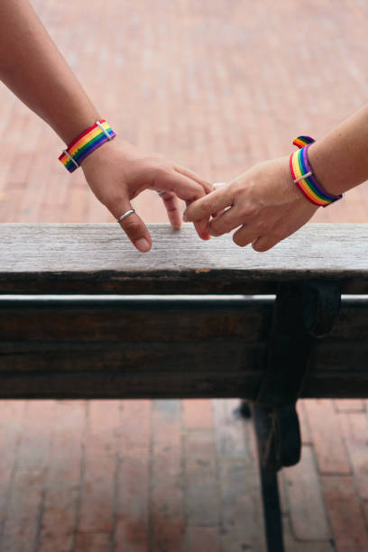 istock Close-up of lesbian women's hands 1340987017