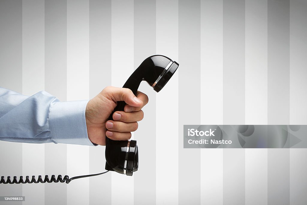 It's for you Human hand holding vintage telephone, with copy space Old-fashioned Stock Photo