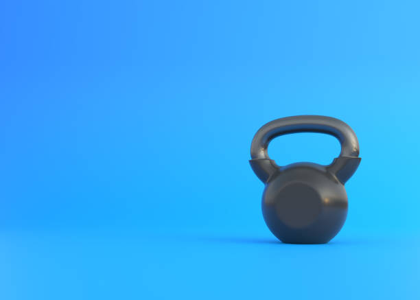 istock Realistic black Iron kettlebell on blue background 1340989482