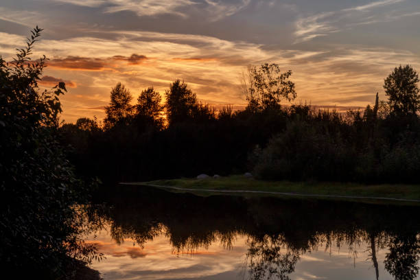 istock lake at sunset, Port Coquitlam, BC, Canada 1340991869