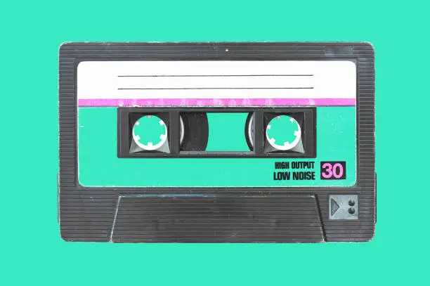 Vintage cassette on a teal background, matching label.