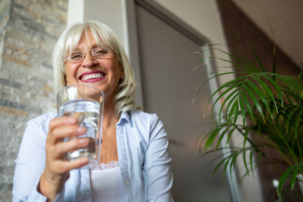 istock Woman With a Glass od Water 1340997132