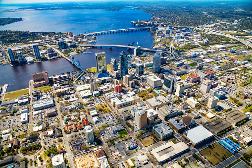 Aerial view of the beautiful downtown area Jacksonville Florida along the St. Johns River from an altitude of about 1500 feet over the city.