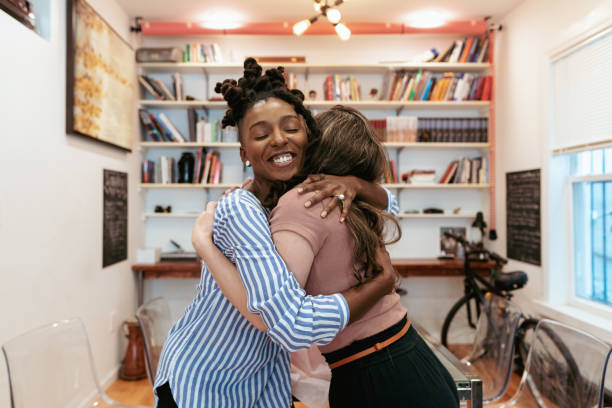 istock Friends giving gifts 1341019289