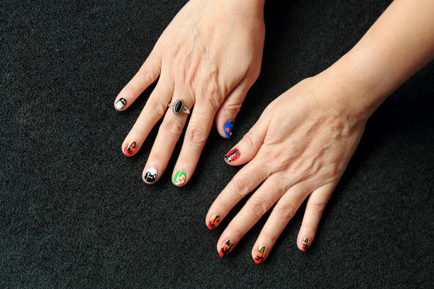 istock Colorful nail polish with an attractive design. 1341024758
