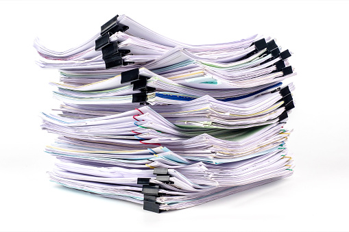 Stack of business paper isolated on white background, job interview and busy business concepts, Document pile on office desk, Overload work, Hard work, pile of papers.