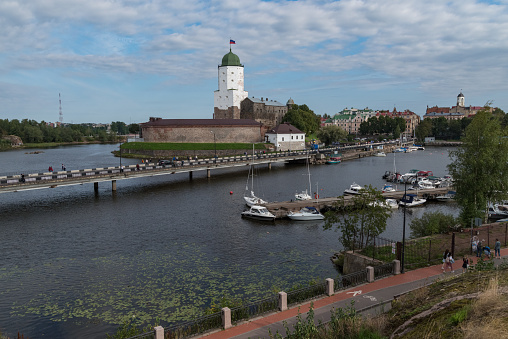 Vyborg, Russia - August 28, 2021: View of Vyborg castle and St. Olav’s tower. Summer season. European part of Russia.
