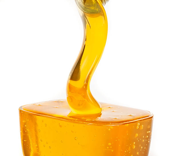 istock Gold flowing honey closeup 134103526