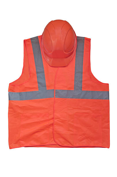istock yellow high visibility vest and protective helmet 134103540