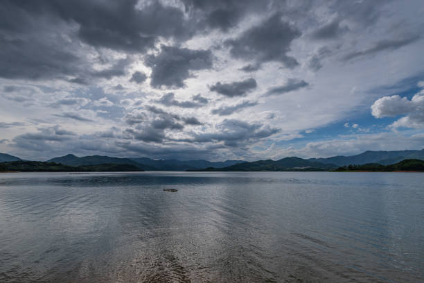 istock The sky is covered with clouds and there are waves on the water 1341038091