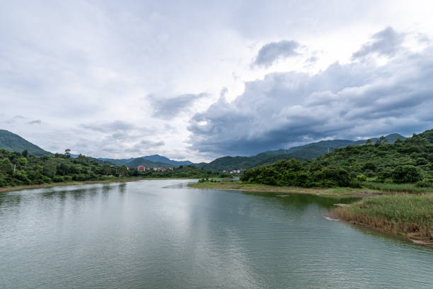 istock The sky is covered with clouds and there are waves on the water 1341038119