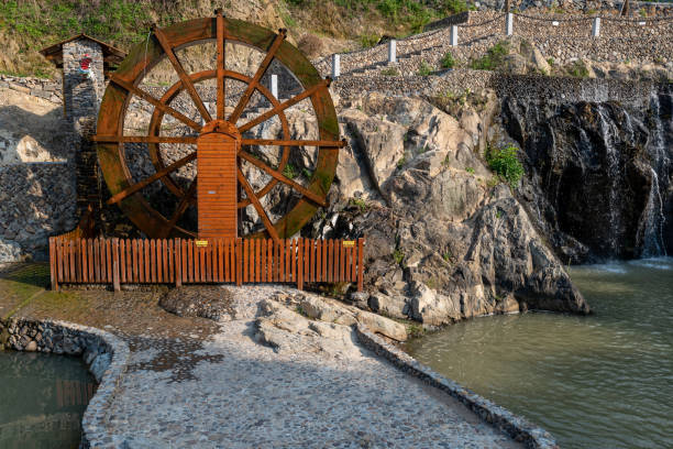 Country scenery, stone bridges and waterwheel