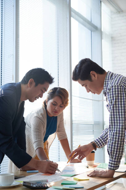 istock Business People Discussing Marketing Strategy 1341041448