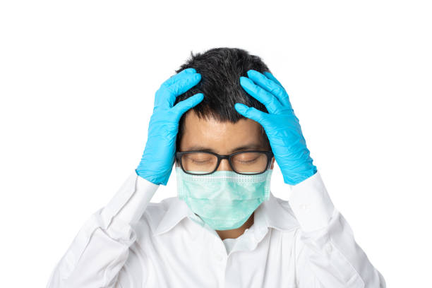 istock Young asian man doctor worried about problems something isolated on white background. 1341047879