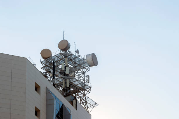 istock Communication antennas on the top of the building 1341051392
