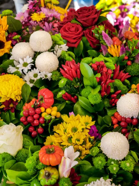 Photo of A wide and colorful variety of flowers with Red Roses, Carnations, Daisies and Gerberas