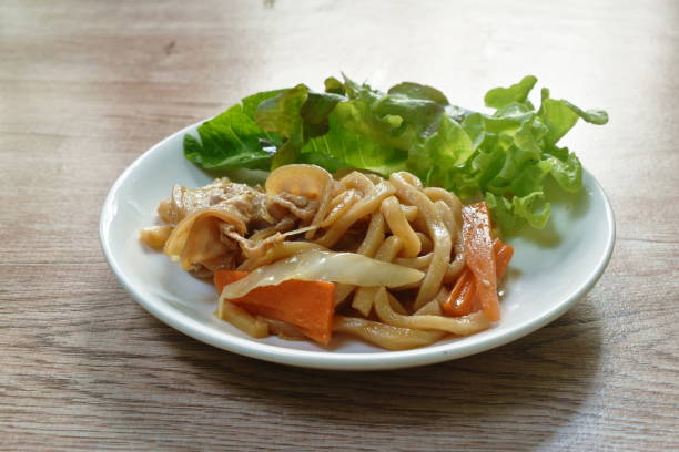 istock spaghetti dressing fried chop chicken and slice mushroom in ketchup sauce 1341059313