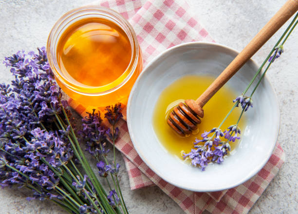 istock Jar with honey and fresh lavender flowers 1341061008