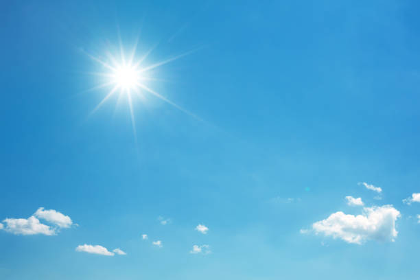istock Beautiful sky with white cloud and sun. Background 1341062061