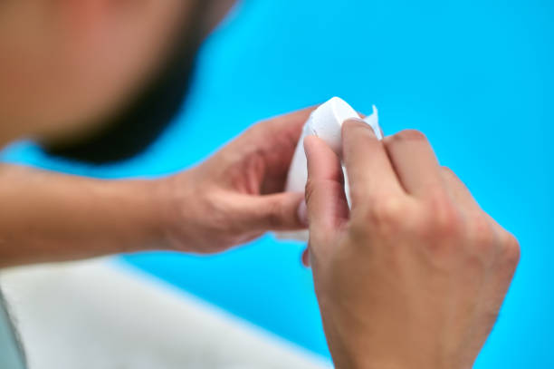 istock Preparation for swimming pool disinfection with chlorine tablets 1341063543