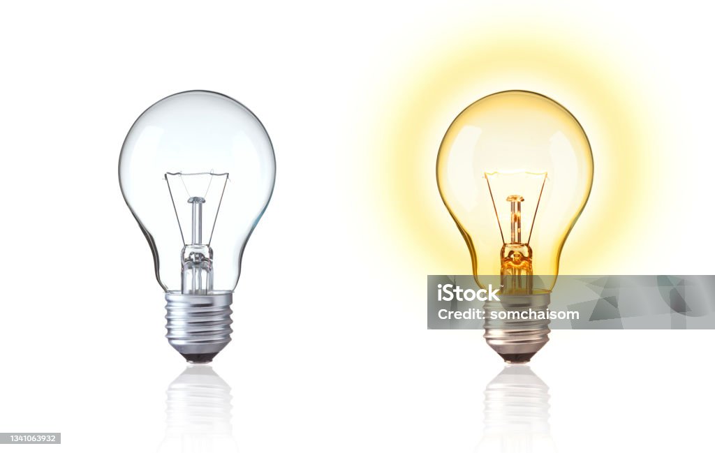 Classic light bulb isolate on white background. Turn on and turn off of Tungsten light bulb show big idea,  innovation, save energy, idea of Evolution, old style or retro light bulb Concept. Light Bulb Stock Photo