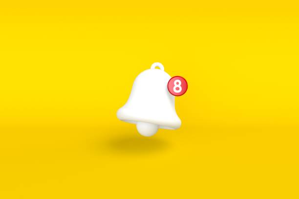 istock Minimal notification bell with new notification on yellow background. 1341067490