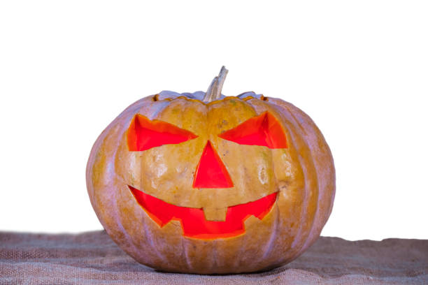 closeup halloween pumpkin isolated on white background, jack-o-lantern traditional holiday scene