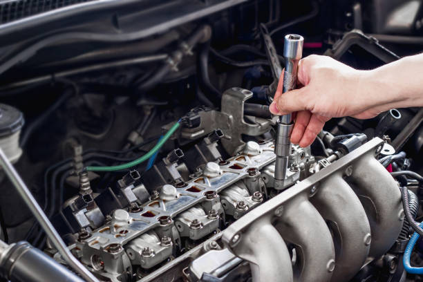 istock Hand a man checking automobile valve system  in the engine room service concept of car 1341071575