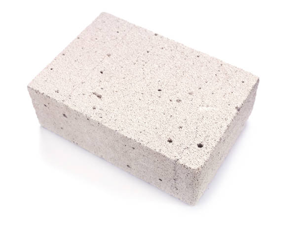 istock Aerated concrete block isolated at white background. Construction brick on white 1341072690