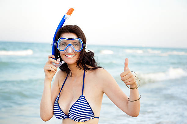 istock Young hispanic woman with underwater mask 134107380