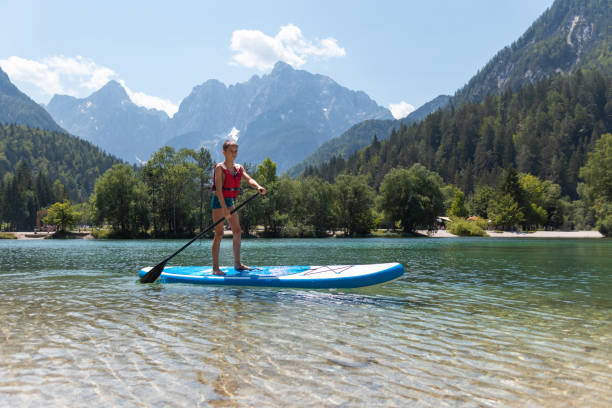 istock Standing on a SUP and paddling 1341075091