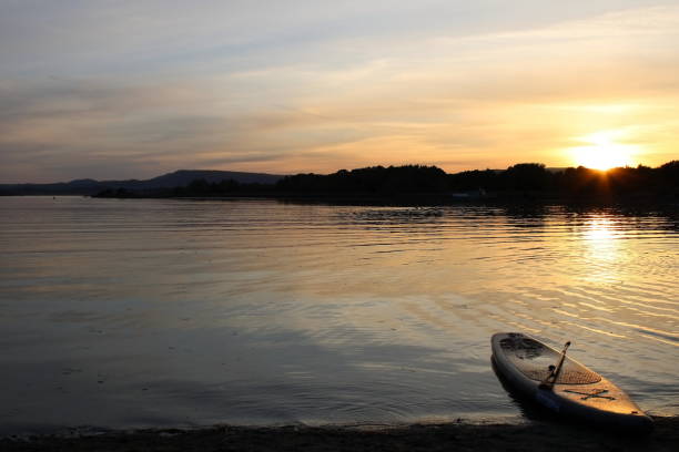 istock Canoe at the sunset and seascape 1341075840