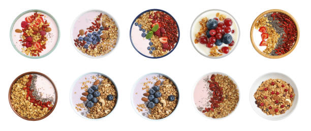 istock Set of different granola breakfasts with berries on white background, top view. Banner design 1341079760