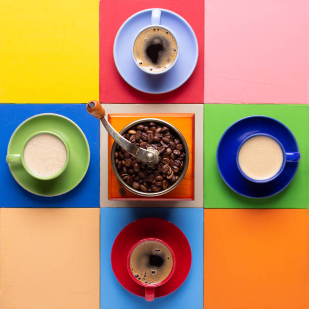 istock Cup of coffee and sweets on colorful abstract background texture. Coffee break time 1341081106