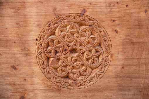 Close-up of a carved decoration on wood