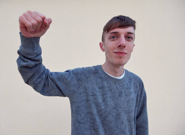istock A young Caucasian male from Spain in a boxing pose standing on plain background 1341082188