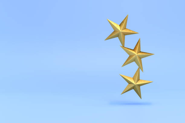istock Three Chrtistmas Stars hovering in front of a blue background. Copy space for your own message. 1341082200