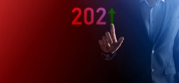 istock Business development to success and growing growth year 2021 concept.Plan business growth graph in year 2021 concept.Businessman plan and increase of positive indicators in his business. 1341084430