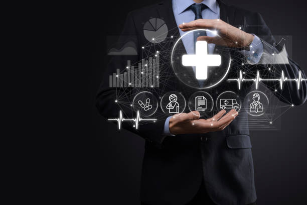 Businessman hold virtual plus medical network connection icons. Covid-19 pandemic develop people awareness and spread attention on their healthcare.Doctor,document,medicine,ambulance,patient icon.