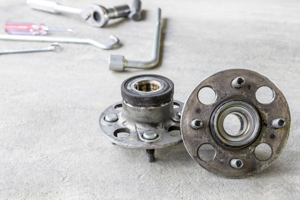 istock Old Wheel Bearings at remove with car change and service concept and tool equipment 1341086581