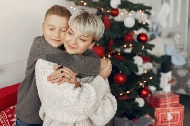 istock People in a winter clothes in a christmass atmosphere 1341088971