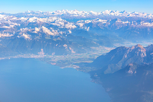 Aerial view on the Swiss Alps and lake Geneva