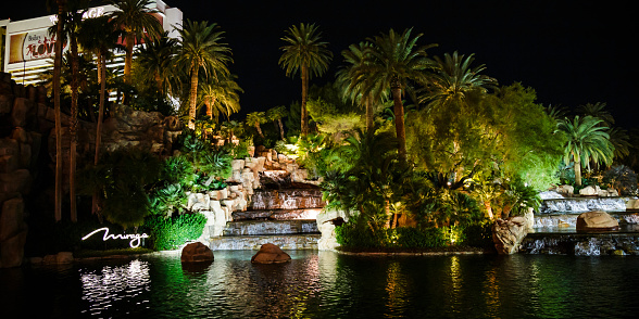 The Mirage waterfall at night, a Hotel and Casino located on the Las Vegas Strip in Paradise, Nevada, USA
