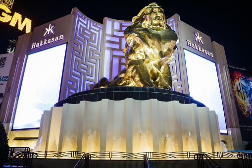 Leo the Lion and the MGM Grand Las Vegas resort hotel in Las Vegas at night, Nevada USA