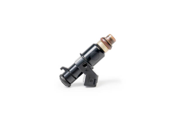 istock Old Gasoline injector part for car in engine system in white background 1341095218