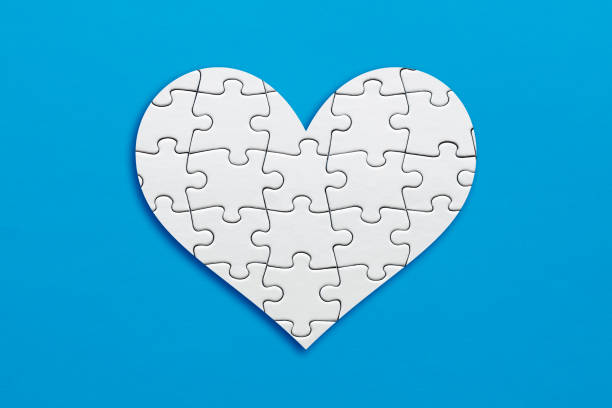 istock Heart shape made out of puzzle pieces. 1341097687