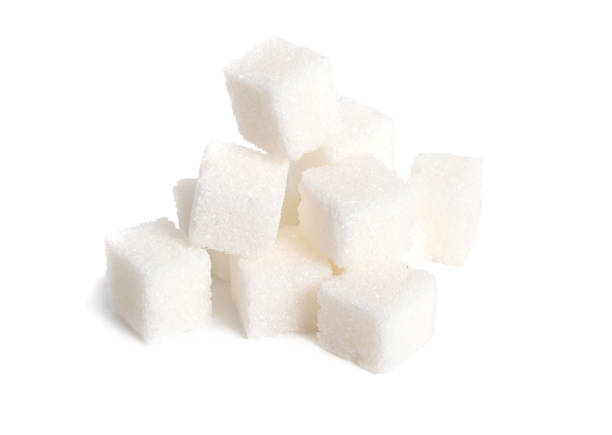 istock Heap of Sugar cubes isolated on white background 1341100369
