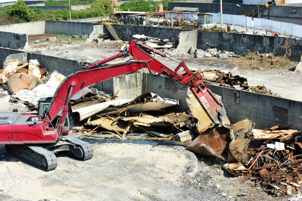 istock Big bulldozer at work for waste disposal 1341102545